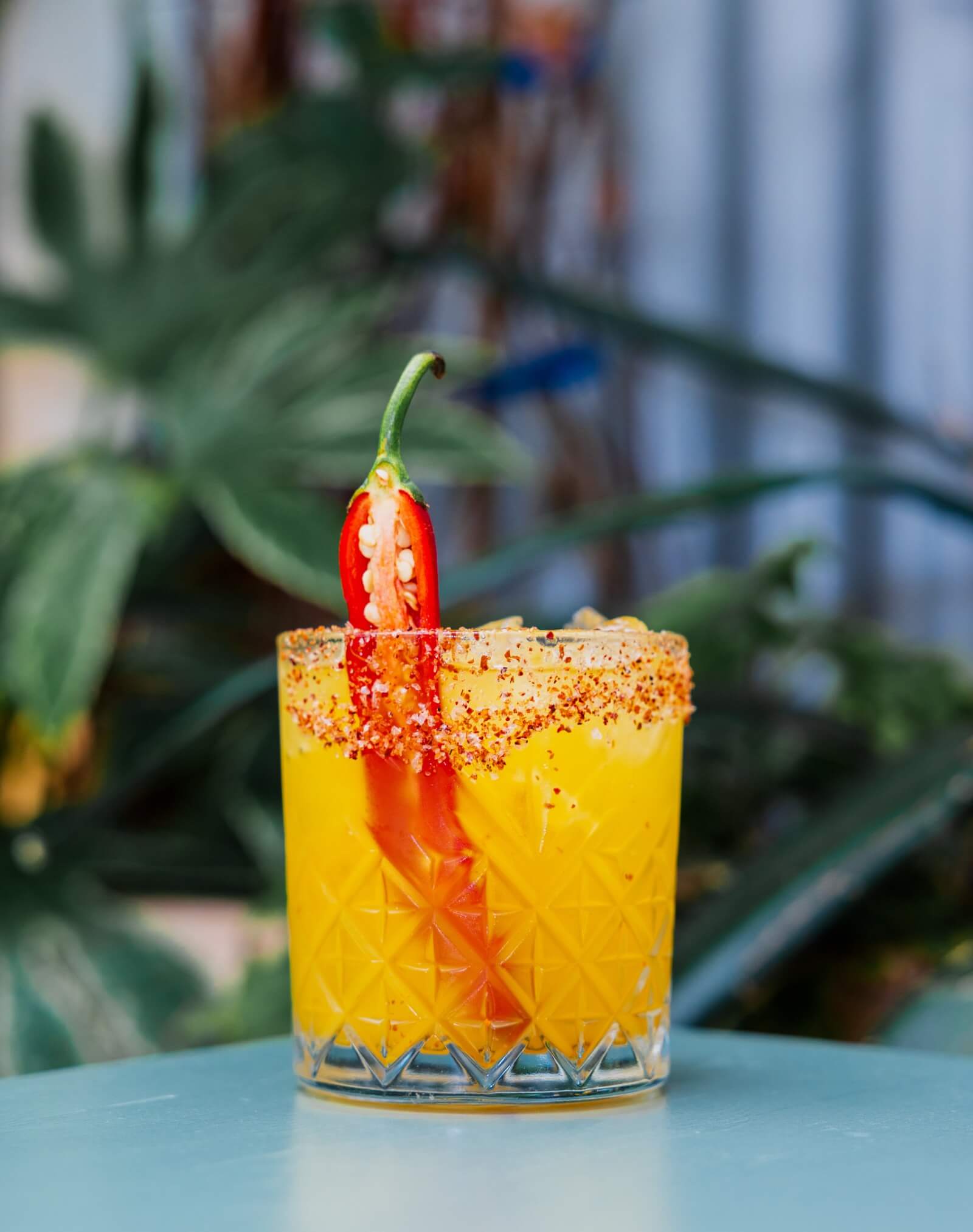 Mango mezcalita on a table at Peckham Arches